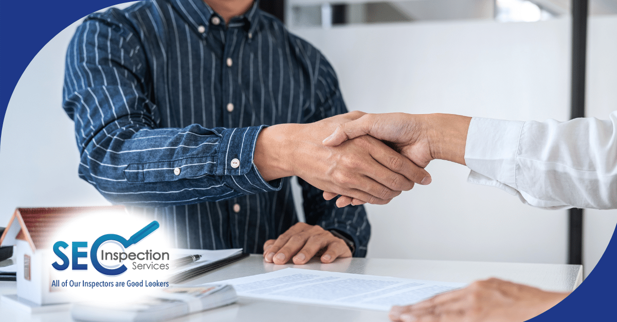 Inspector and client shaking hands after a successful home inspection agreement.
