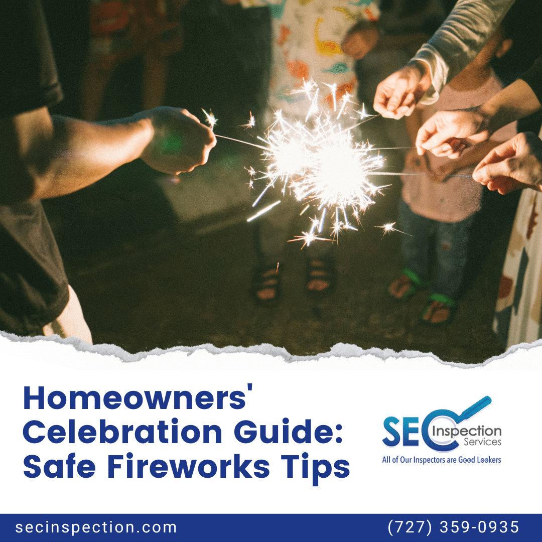 Group of people holding sparklers during a nighttime celebration